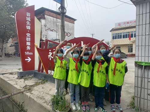 彭州市北君平小学开展“红领巾”志愿服务活动