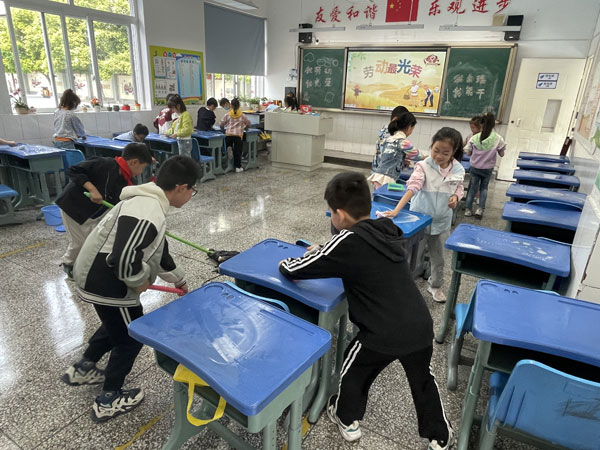 崇州市学府小学校开展“我劳动 我光荣”劳动节系列活动